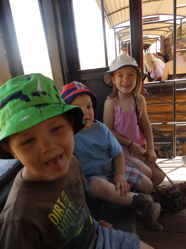 Dominic, Damien, and Amelia on the train in Calico.