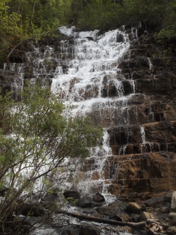 Beautiful waterfalls can even be seen from the road.