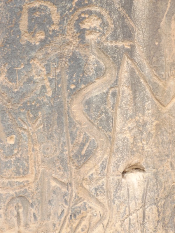 Petroglyphs carved into a cliffside